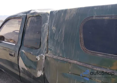 1999 Toyota Tacoma из США, поврежденный, VIN 4TAVL52N9XZ454218